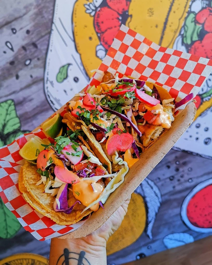 Baja fish tacos with crispy battered fish, slaw and chipotle crema at Don Taco Calgary