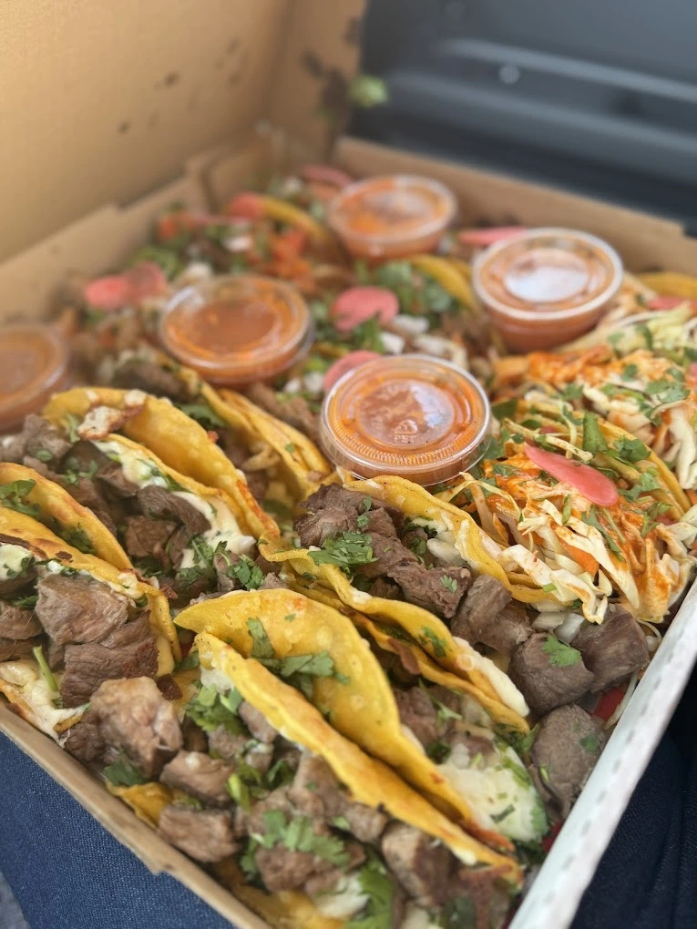 Mexican catering tray of assorted tacos with salsas at Don Taco Calgary